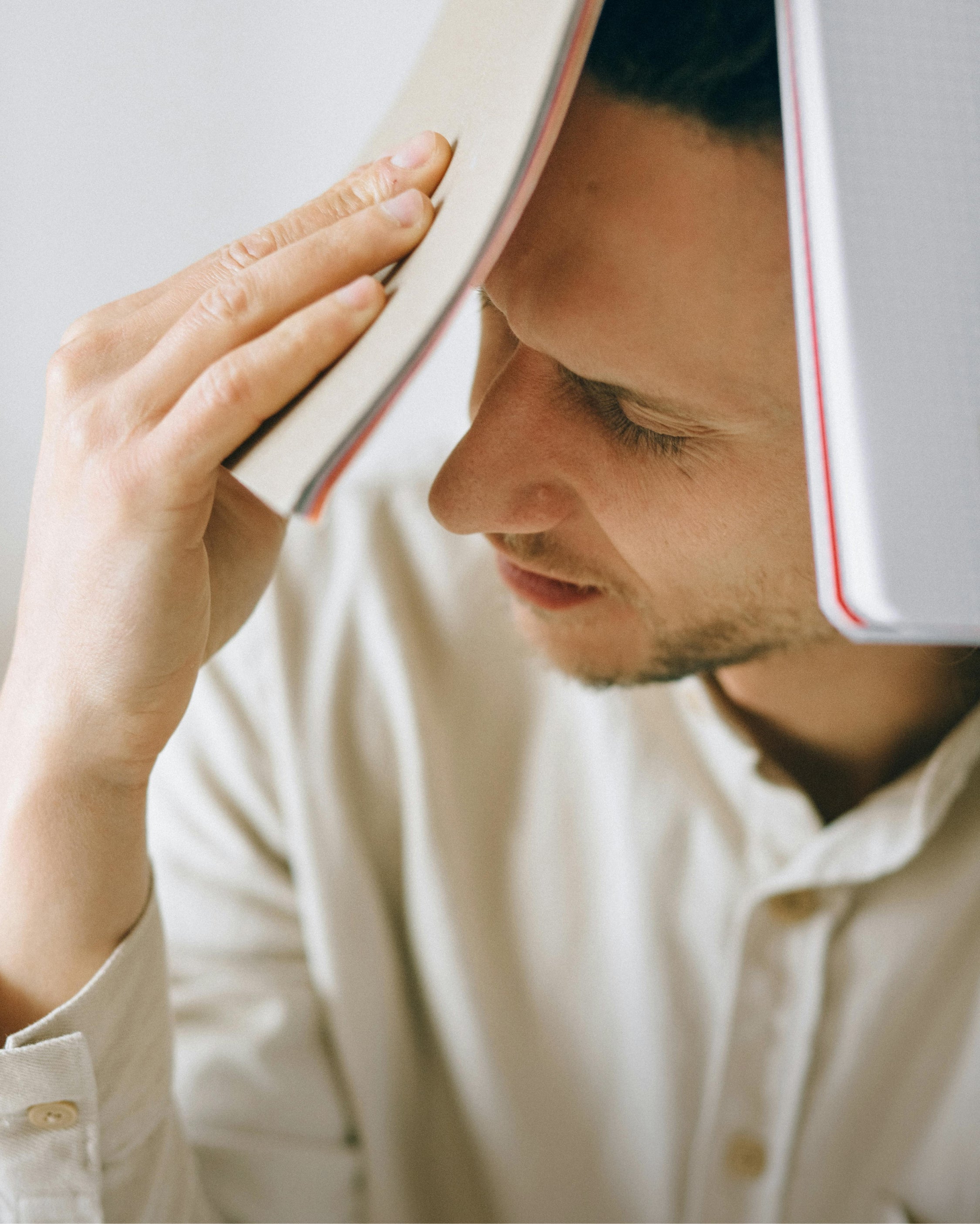 person feeling stressed with physical tension related to digestion