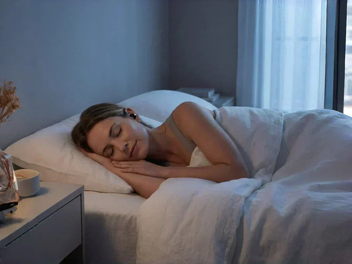 woman sleeping peacefully after a nighttime nervous system recovery routine