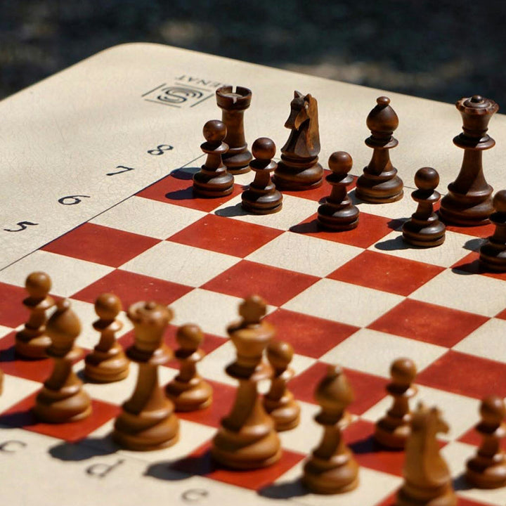 Close-up of a chessboard symbolizing focus and strategic thinking during mental tasks
